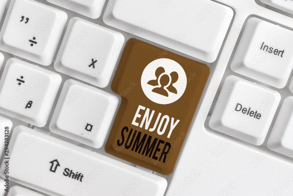 Handwriting text writing Enjoy Summer. Conceptual photo taking a break from school and spending holidays in the beach White pc keyboard with empty note paper above white background key copy space Handwriting text writing Enjoy Summer. Conceptual photo taking a break from school and spending holidays in the beach White pc keyboard with empty note paper above white background key copy space