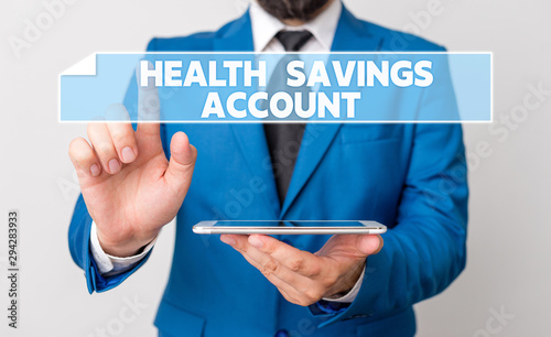 Handwriting text Health Savings Account. Conceptual photo users with High Deductible Health Insurance Policy Businessman with pointing finger in front of him photo