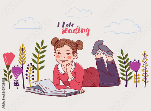 Cute little girl reading a book