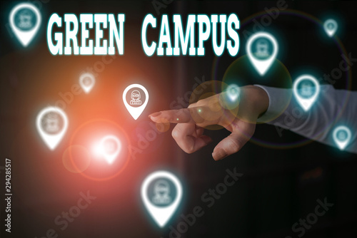 Writing note showing Green Campus. Business concept for sustainable and environmentally friendly educational facility Woman wear formal work suit presenting presentation using smart device