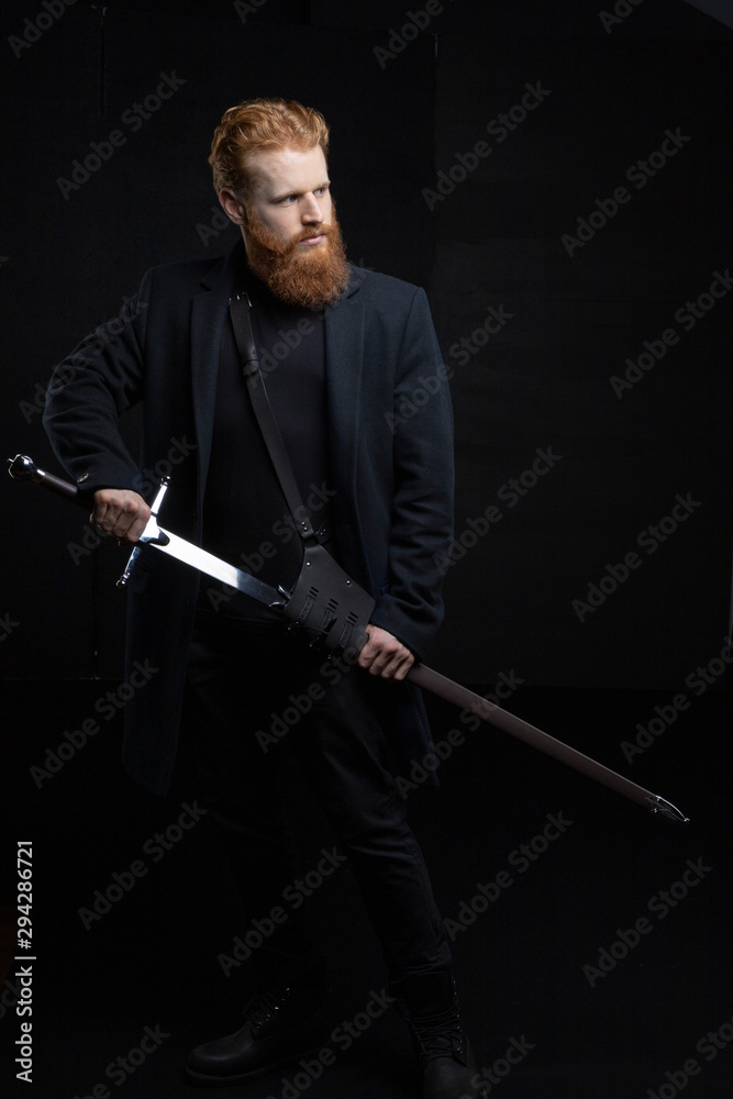 Red-haired urban fantasy man with tattoos Red-haired urban fantasy man with tattoos