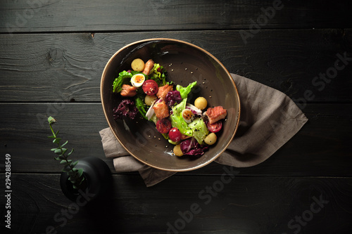 Caesar salad with salmon . catering menu