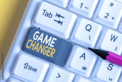 Conceptual hand writing showing Game Changer. Concept meaning way that effects a major shift in the current analysisner of doing White pc keyboard with note paper above the white background photo