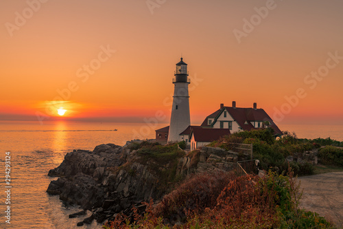 Magical sunrise at the iconic Portland Head Light. Portland  Maine