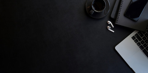 Modern workplace with dark luxury style with copy space and office supplies