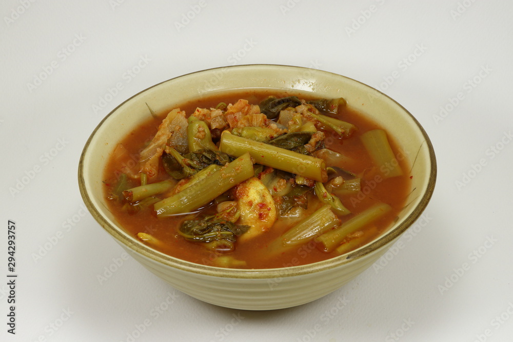 Thai curry with mix vegetable, as Morning glory, cabbage, Cattleya, and chilly. Traditional delicious menu in Thailand. Thai curry with mix vegetable, as Morning glory, cabbage, Cattleya, and chilly. Traditional delicious menu in Thailand.