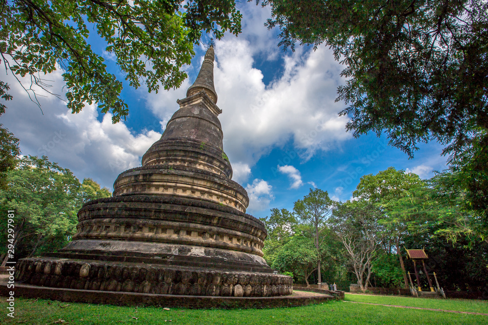 Natural background, large old pagoda (Wat Umong Suan Phutthatham), in Chiang Mai, is a famous tourist destination, tourists are always popular to make merit and see the beauty according to the seasons