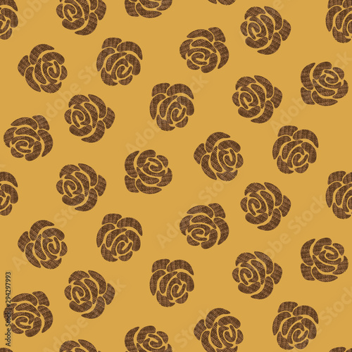 A seamless vector pattern with textured vrown roses on a mustard yellow background. Surface print design.