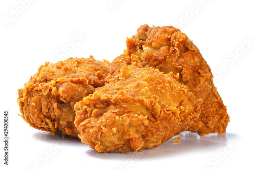 Photo yellow fried chicken thighs on white background