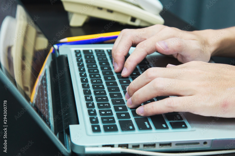 businessman working use laptop in office for discussing documents and ideas , with soft focus, vintage tone businessman working use laptop in office for discussing documents and ideas , with soft focus, vintage tone