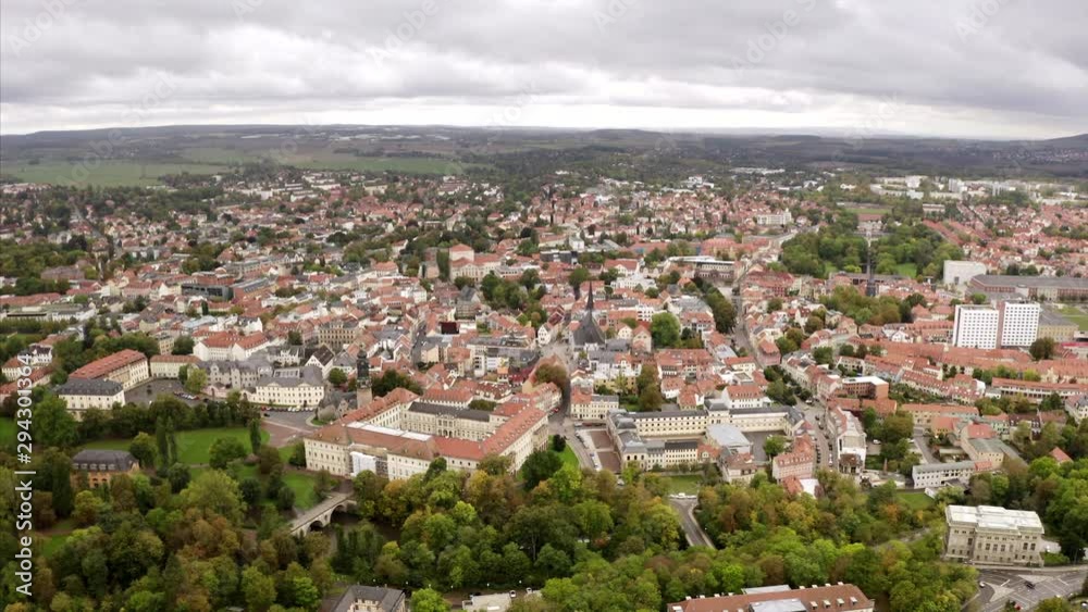 The city of Weimar in a wide aerial shot. The cityscape in Thuringia where Goethe and Schiller lived with a cloudy sky. The city of Weimar in a wide aerial shot. The cityscape in Thuringia where Goethe and Schiller lived with a cloudy sky.