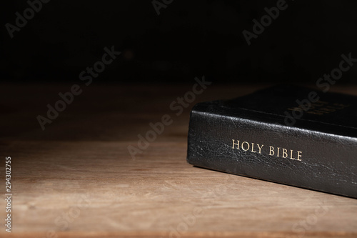 Holy Bible on a wooden table