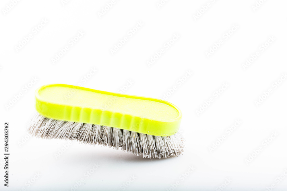 Close-up dirty clothes brush isolated on a white background Close-up dirty clothes brush isolated on a white background