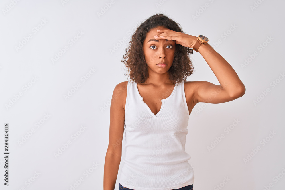 Young brazilian woman wearing casual t-shirt standing over isolated white background worried and stressed about a problem with hand on forehead, nervous and anxious for crisis Young brazilian woman wearing casual t-shirt standing over isolated white background worried and stressed about a problem with hand on forehead, nervous and anxious for crisis