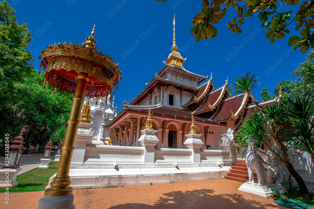background,Open view of the temple at Dara Pirom Temple (Mae Rim),which has a large statue in front of the temple. Covered by trees and sky, Chiang Mai Province, Thailand, Wat Pa Daphirom