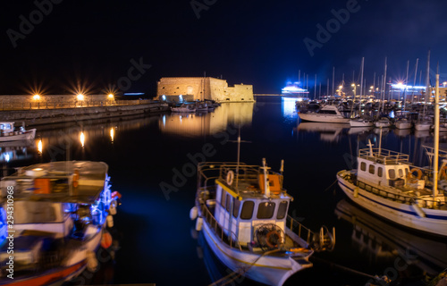 View of old harbour of Heraklion with Venetian Koules Fortress at the night. Crete, Greece. Heraklion by night. Koule fort at Iraklion, night. © Artem