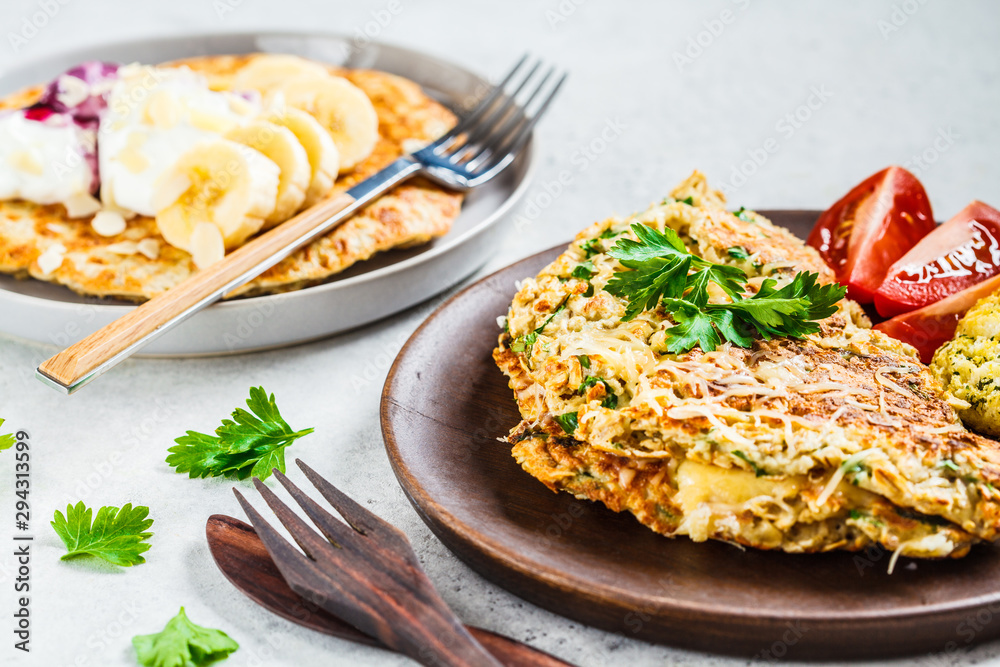 Oatmeal omelet with cheese and sweet oatmeal pancake. Healthy breakfast concept.