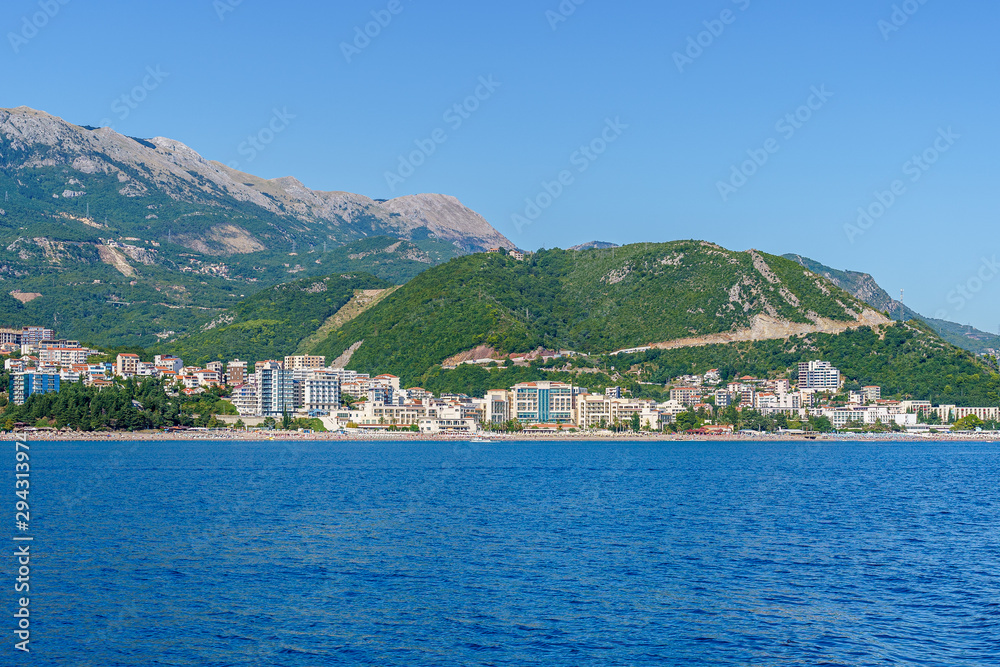 Budva Riviera in Montenegro, view from the sea on a summer day