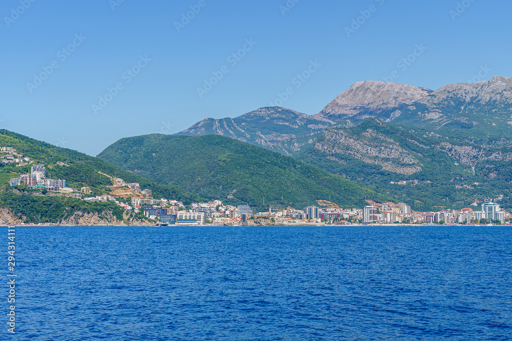 Budva Riviera in Montenegro, view from the sea on a summer day