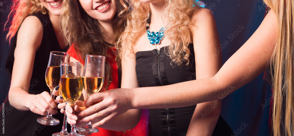 Birthday party, new year and holidays concept - Cheerful female friends celebrating with glasses of champagne, close-up
