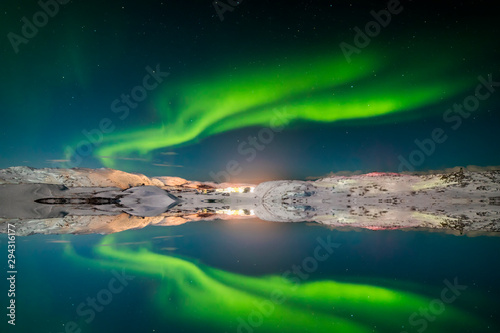 Northern Lights on the shore of the Arctic Ocean. © Anton Petrus