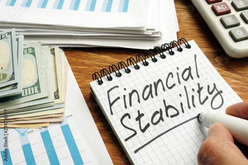 Canvastavla Man writes Financial stability in the note.