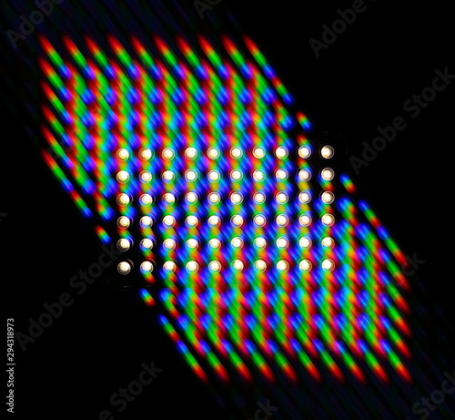 Photo of the diffraction pattern of LED array light, comprising a large number of diffraction orders obtained by the phase grating