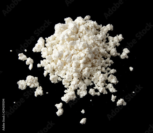 white cottage cheese on a black background