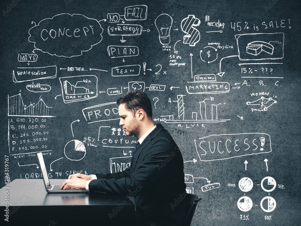businessman sitting in office businessman sitting in office