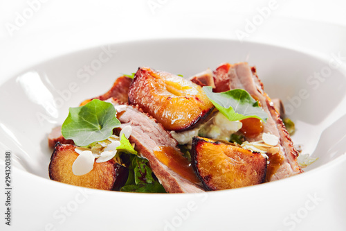 Salad with Roasted Duck Breast, Baked Pear and Strachatella