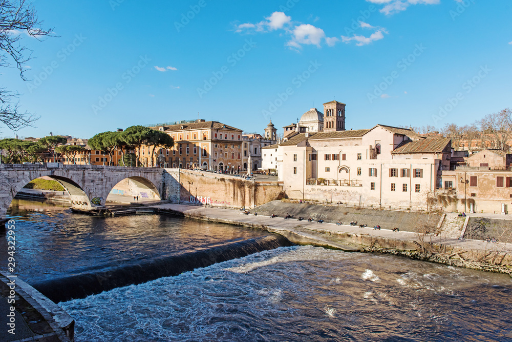 Rome, Italy. Tiber River and stone bridge, Ponte Cestio in Rome. Italy