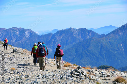 Trekkers walking along the ridgeline of mt.Tateyama, Toyama, Japan