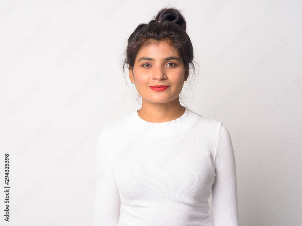 Portrait of young beautiful Persian woman looking at camera Portrait of young beautiful Persian woman looking at camera