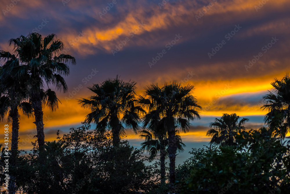 Obraz premium Dramatic vibrant sunset scenery in Donna Victoria Palms RV Resort, Texas