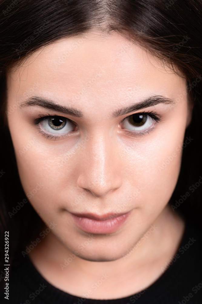 Beautiful woman with heterochromia, portrait with two different eyes Beautiful woman with heterochromia, portrait with two different eyes