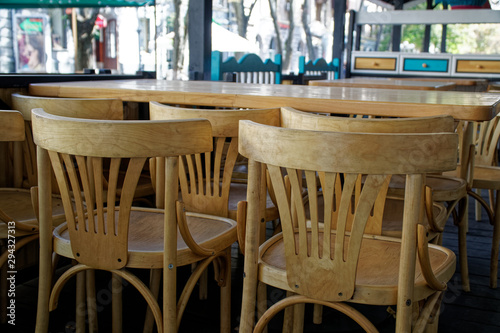 Fototapeta Naklejka Na Ścianę i Meble -  Wooden Vintage chairs in cafe, modern cozy interior