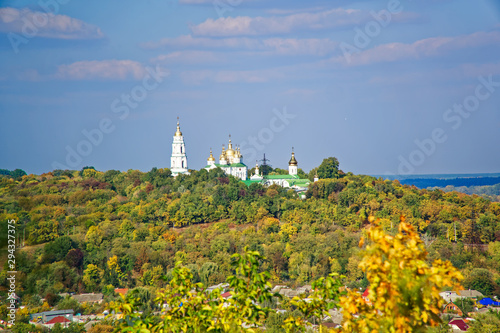 Monastery caves - view from the banks of Vorskla River in early autumn photo