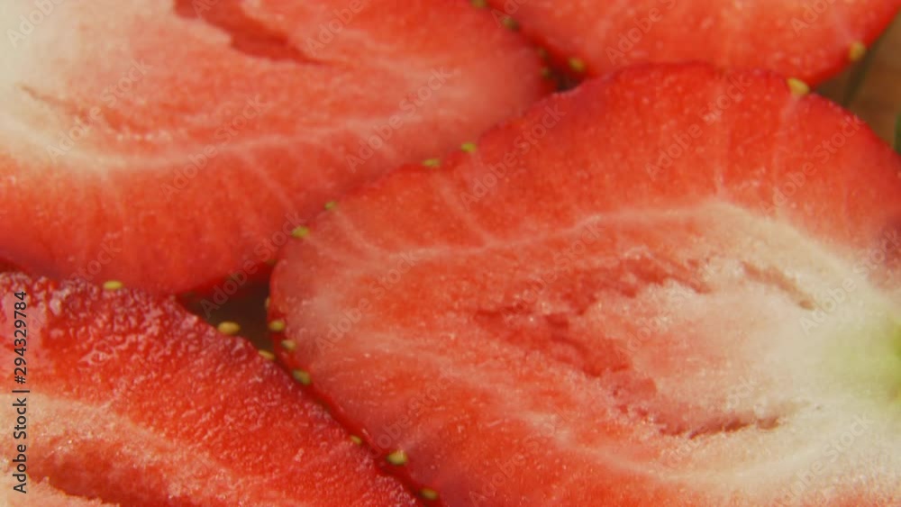 4k macro tilting view of sliced strawberries, close up strawberry slices 4k macro tilting view of sliced strawberries, close up strawberry slices
