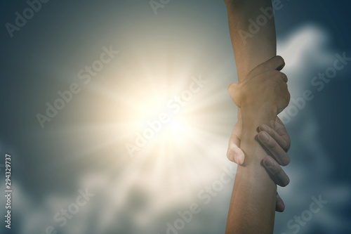 God giving a helping hand to human © Leo Lintang