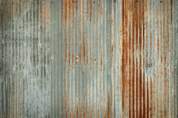 Old zinc wall texture background, rusty on galvanized metal panel sheeting.
