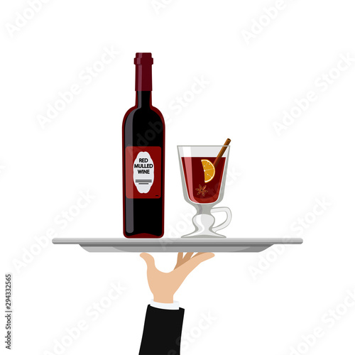 Mulled wine bottle and glass on tray