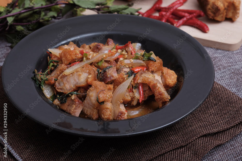 Thai food fried basil with crispy pork