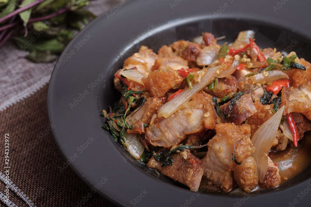 Thai food fried basil with crispy pork Thai food fried basil with crispy pork