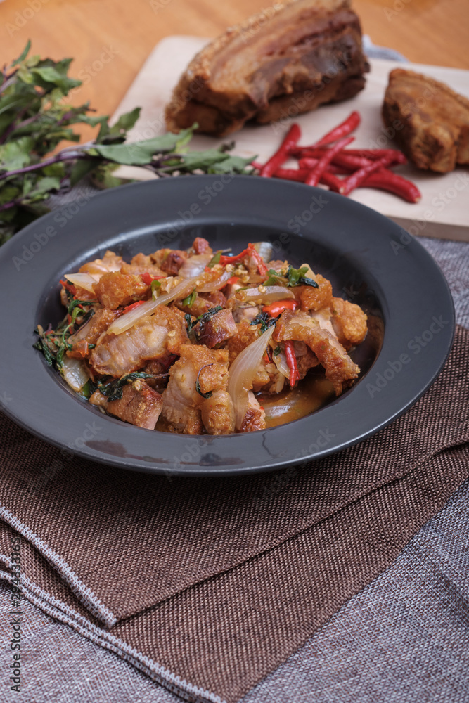 Fototapeta premium Thai food fried basil with crispy pork