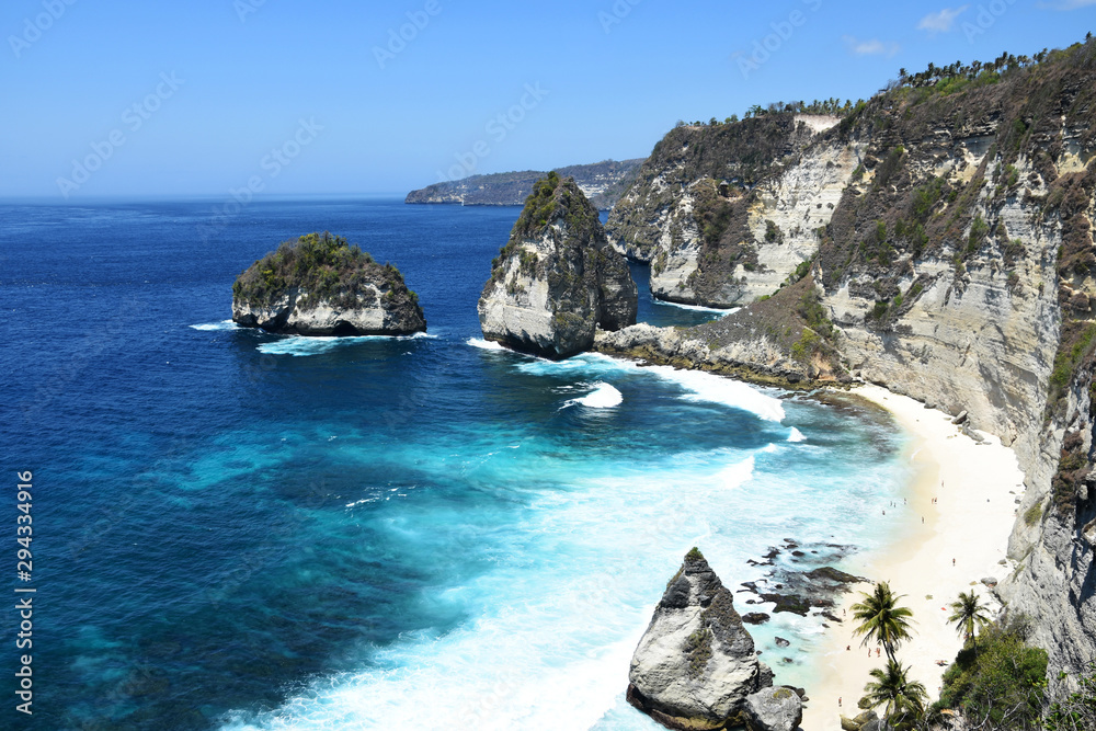Island in the sea, beautiful view of white sand beach, popular as Diamond Beach, Nusa Penida Island, Bali.