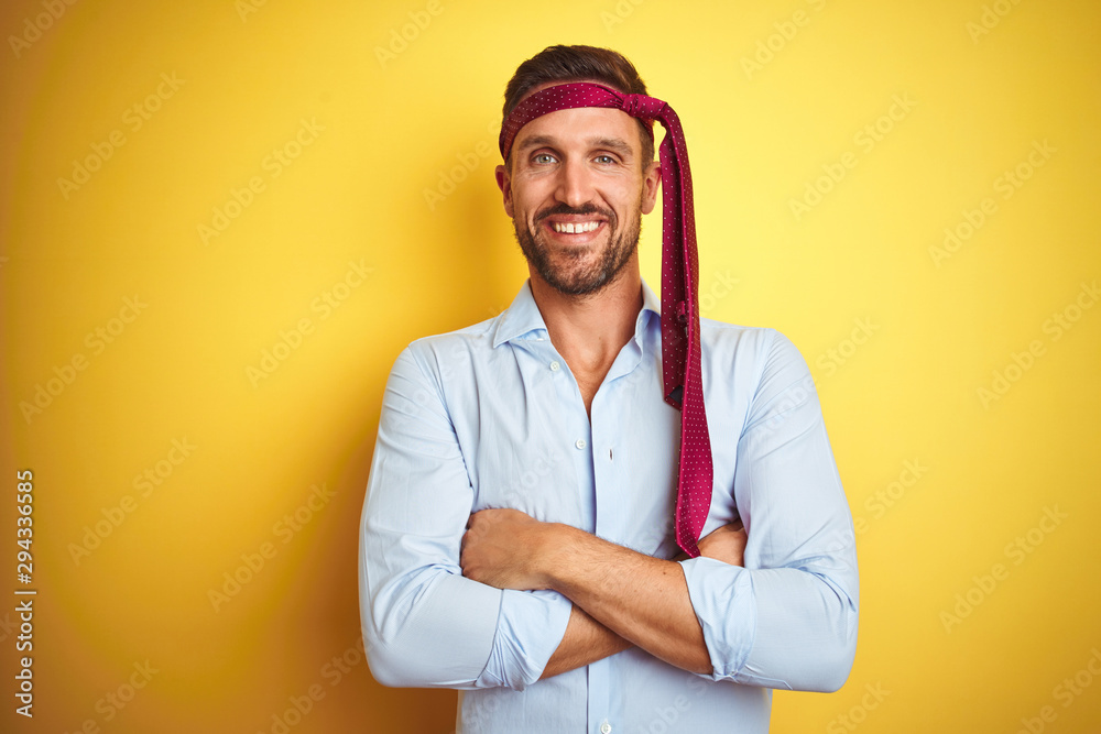 Hangover business man drunk and crazy for hangover wearing tie on head happy face smiling with crossed arms looking at the camera. Positive person. Hangover business man drunk and crazy for hangover wearing tie on head happy face smiling with crossed arms looking at the camera. Positive person.