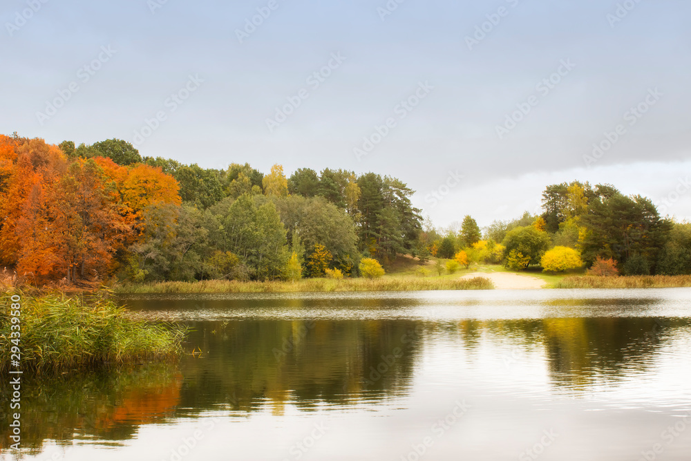 Very nice scenery. Autumn, lake and forest in natural colors during the fall Very nice scenery. Autumn, lake and forest in natural colors during the fall