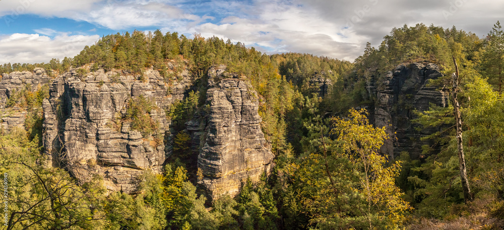 landscape in mountains - panorama overlooking the valley with forests and sandstone rocks, national park Bohemian Switzerland, Czech republic
