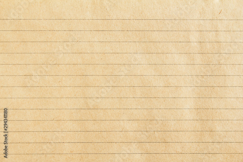 Brown lined craft notebook paper texture background. photo