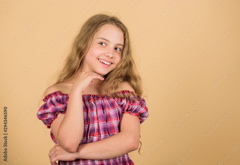 Positive emotions. Happiness concept. Be positive and keep smiling. Adorable beauty model with cute smile. Small child long hair cheerful smiling face. Little girl happy smiling. Happy childhood Positive emotions. Happiness concept. Be positive and keep smiling. Adorable beauty model with cute smile. Small child long hair cheerful smiling face. Little girl happy smiling. Happy childhood